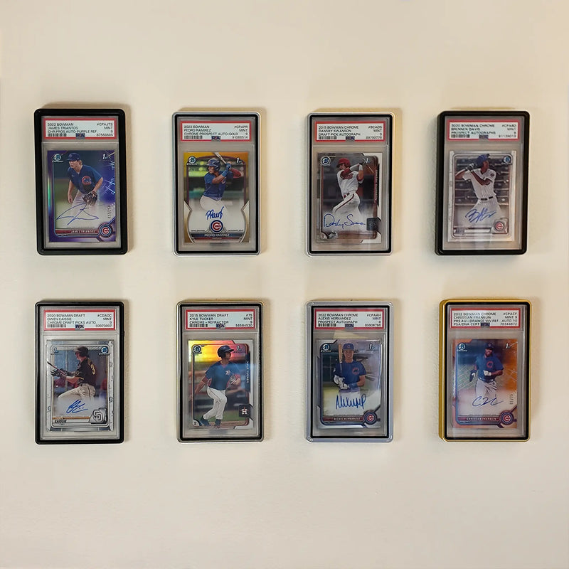 Eight PSA slabs mounted in two-row FlexDeez grid on a flat interior wall
